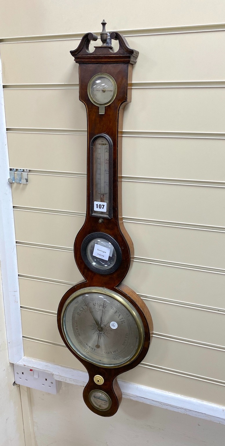 An early 19th century wheel barometer, height 908cm